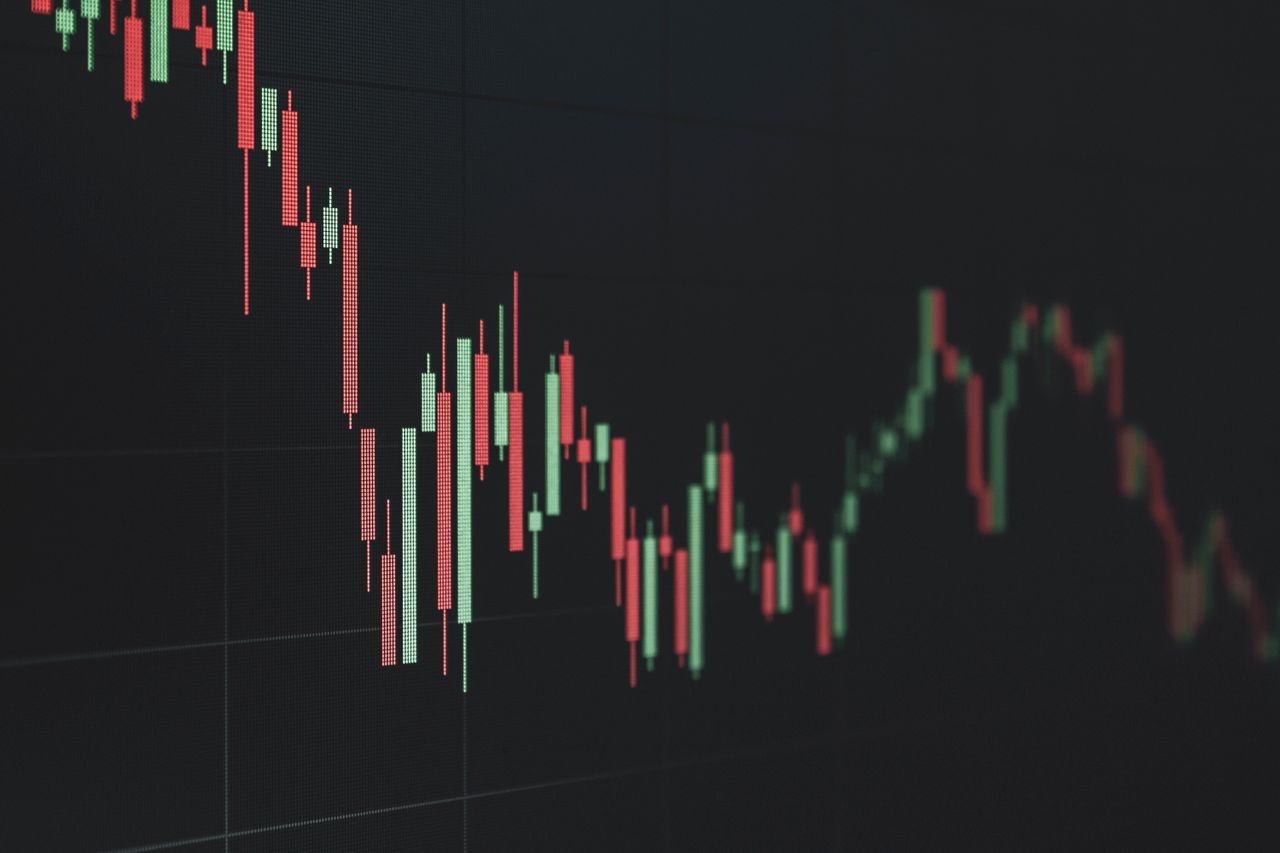 Stock market data chart showing trends in red and green. Perfect for financial and business themes.