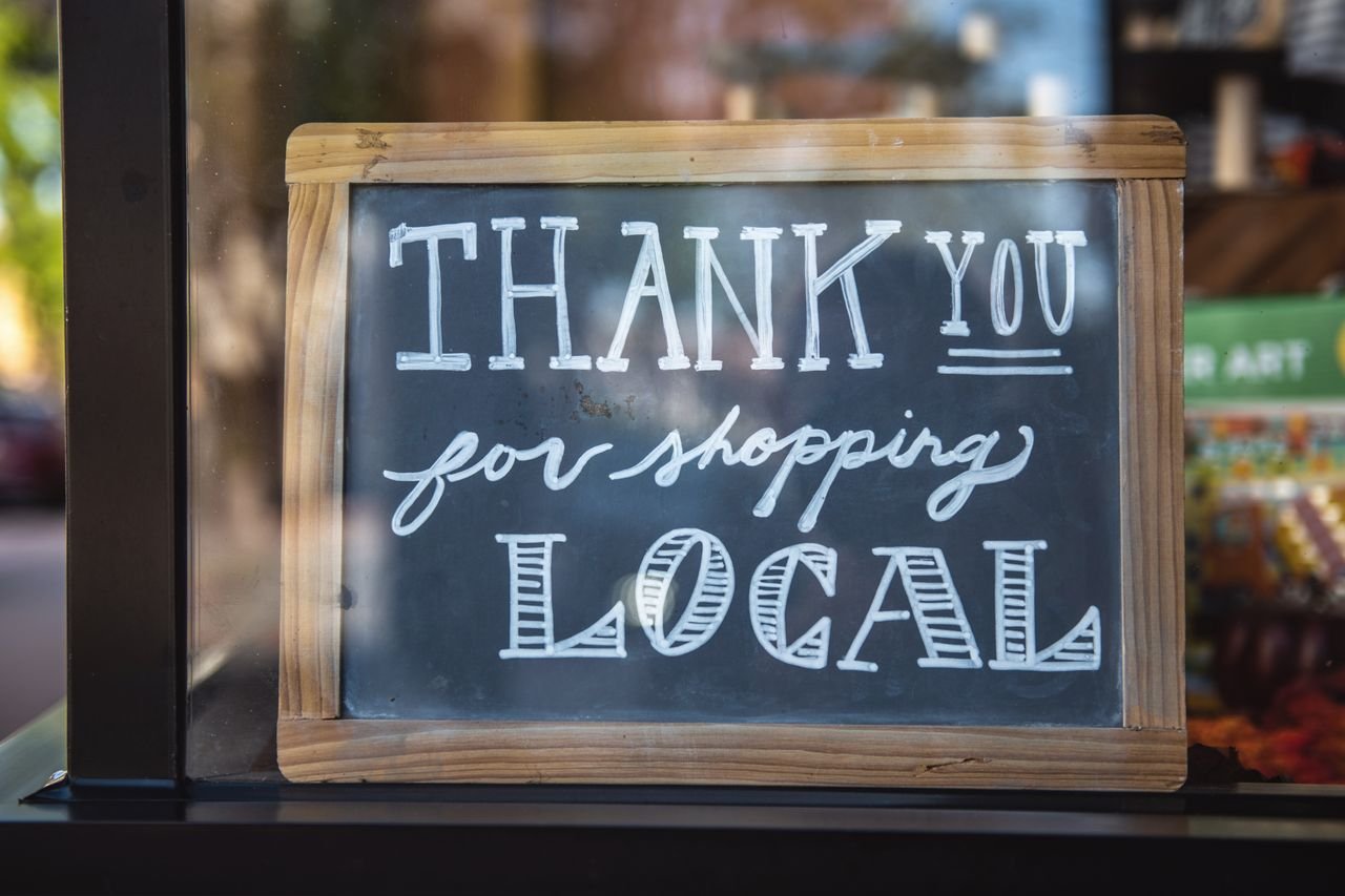 Home Chalkboard sign encourages shopping local in San Luis Obispo store.